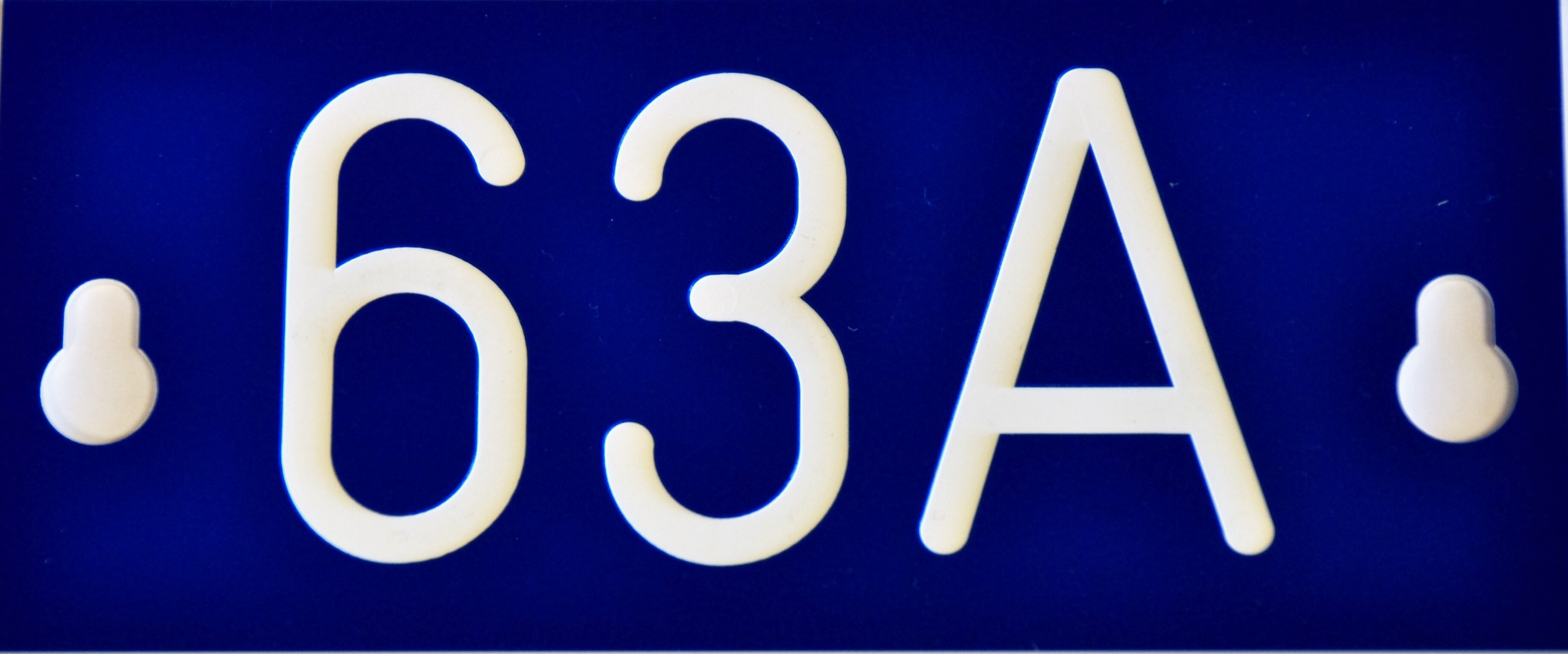 Melbye - Merkelskilt blå 63A 64x146x1,6mm ensidig